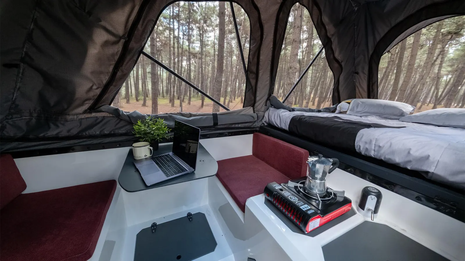 Atlas: inside the box: two seats, the portable stove and the tent bed above