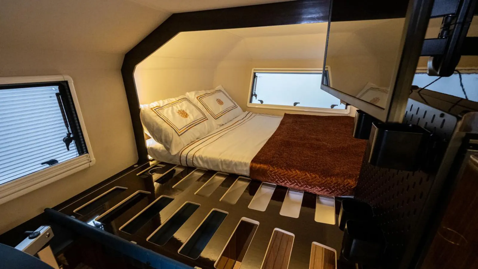 Cyberglad: the bed in the alcove above the truck's cab