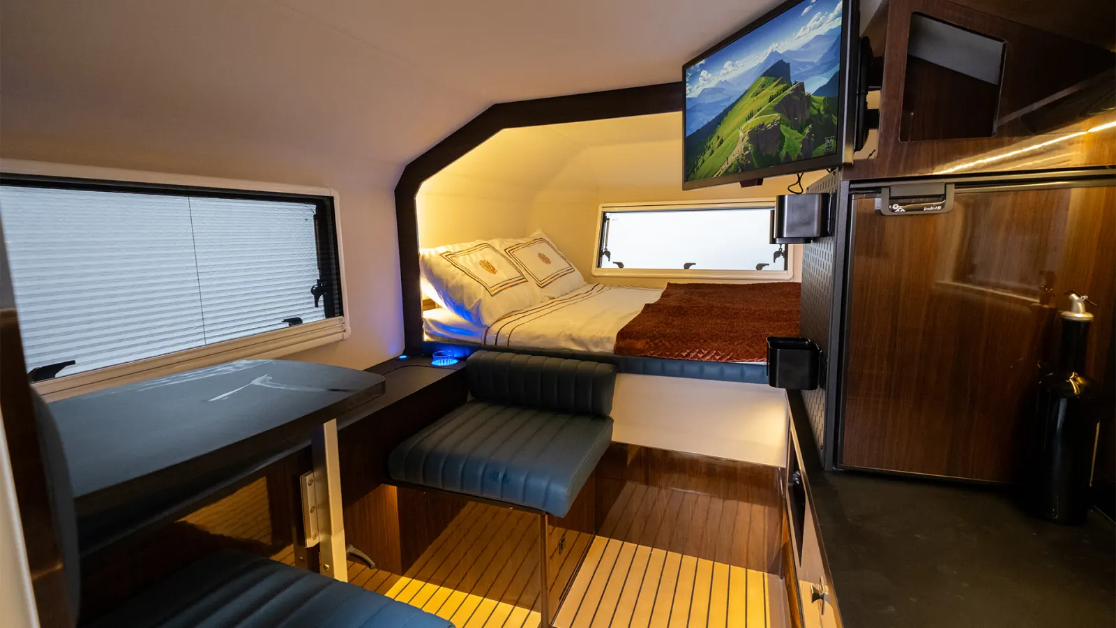 Cyberglad: seat, bed and fridge, with the TV option on its bracket
