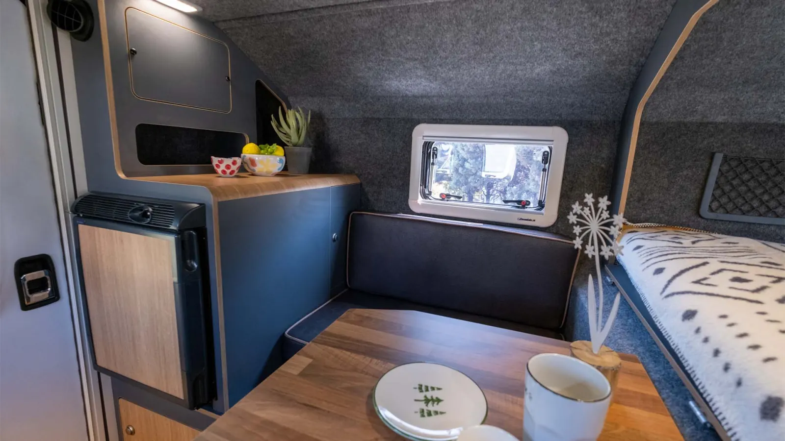Gladiator S: the 42 L fridge beside the dinette bench